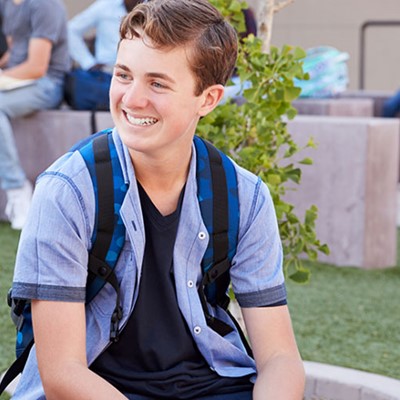 Students sat talking in the yard